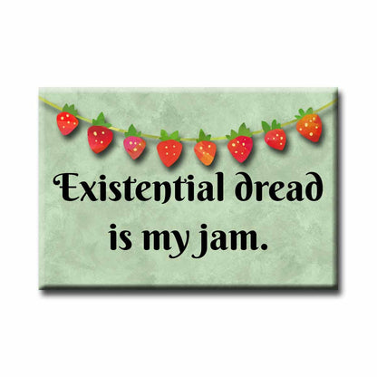 Fridge magnet with strawberry design and text 'Existential dread is my jam' on a green background