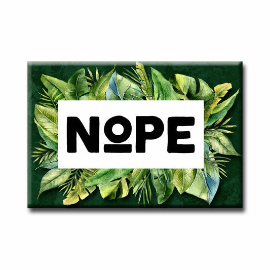 Fridge magnet with 'NOPE' text surrounded by green leafy design on a white background