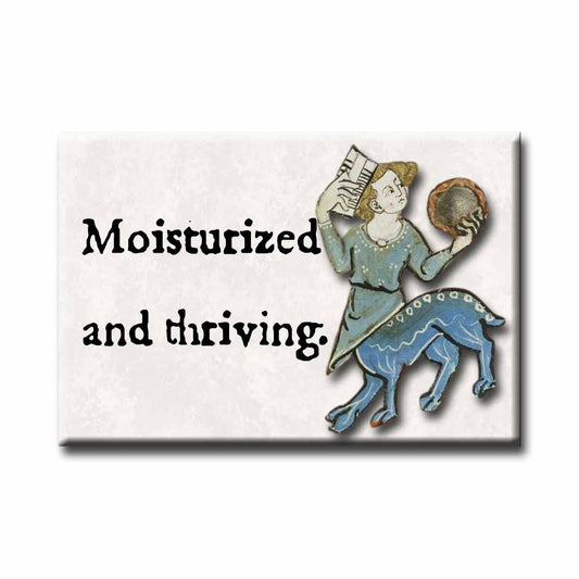 Medieval marginalia illustration of a half-person, half-dog, accompanied by the text 'Moisturized and thriving.'