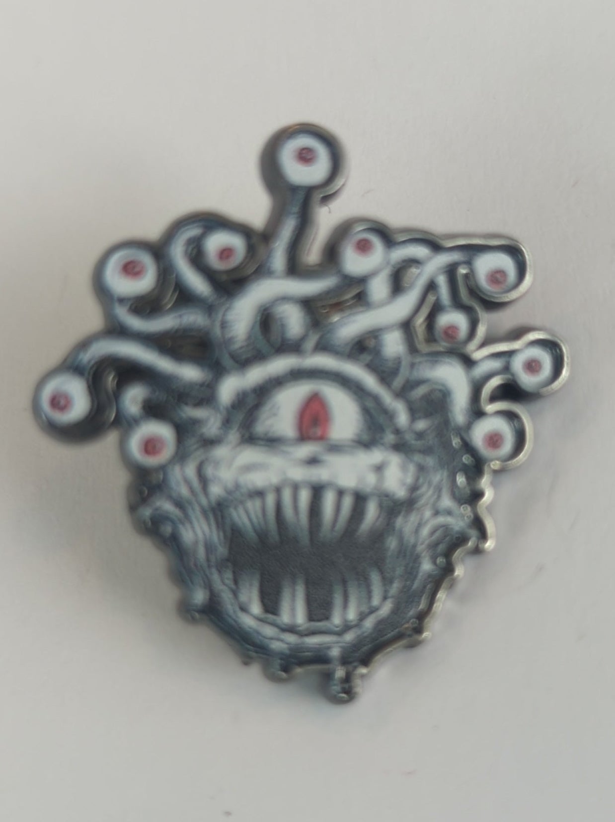 Beholder Enamel Pin