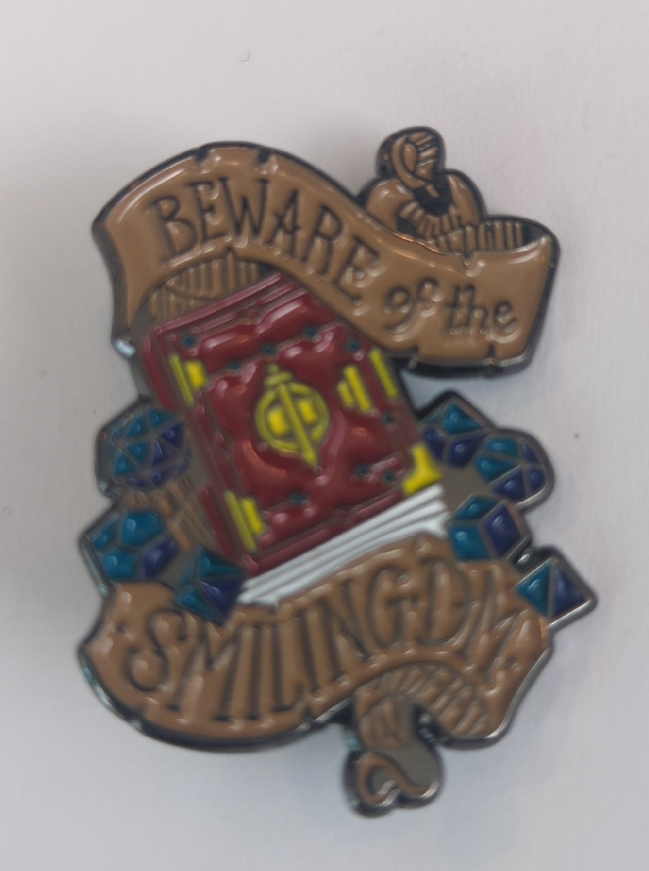 Beware the Smiling DM Enamel Pin