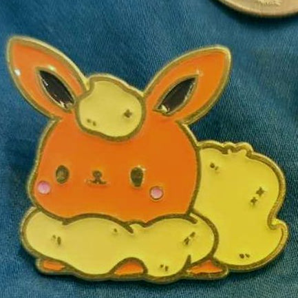 enamel pin of the pokemon flareon
